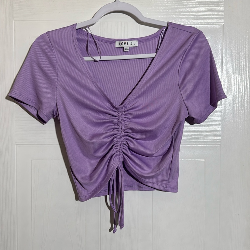 Love j size M shirt.